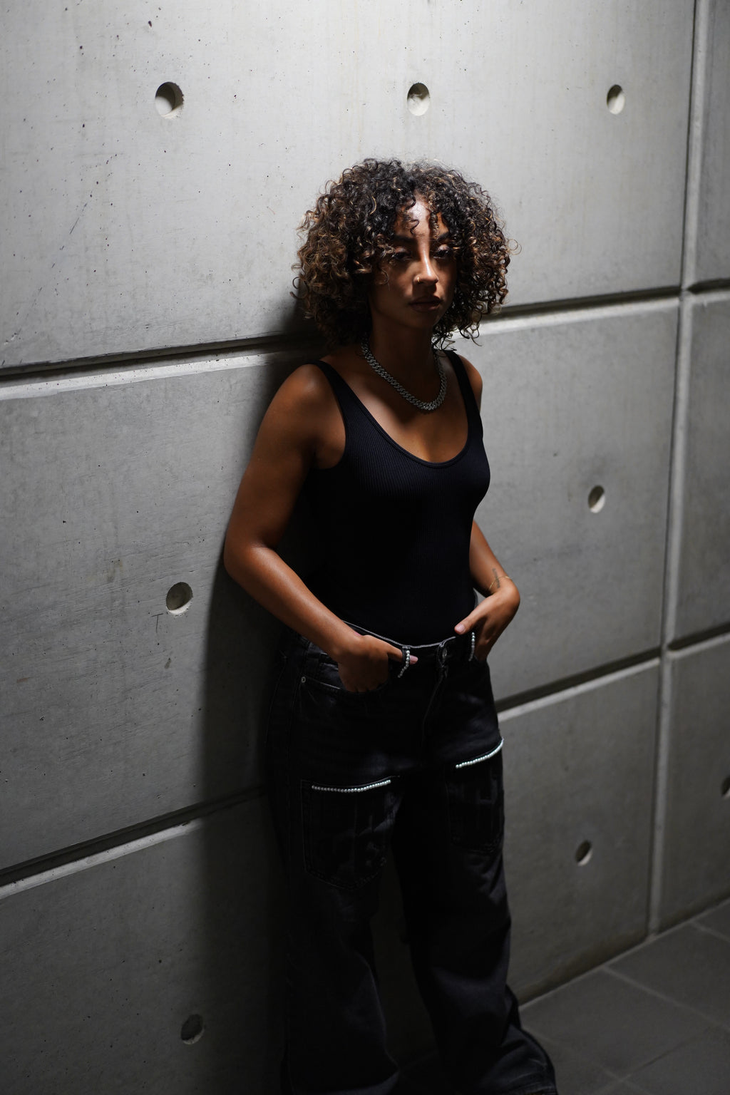 BLACK FLARED DENIM WITH PEARLS AND PATCHWORK