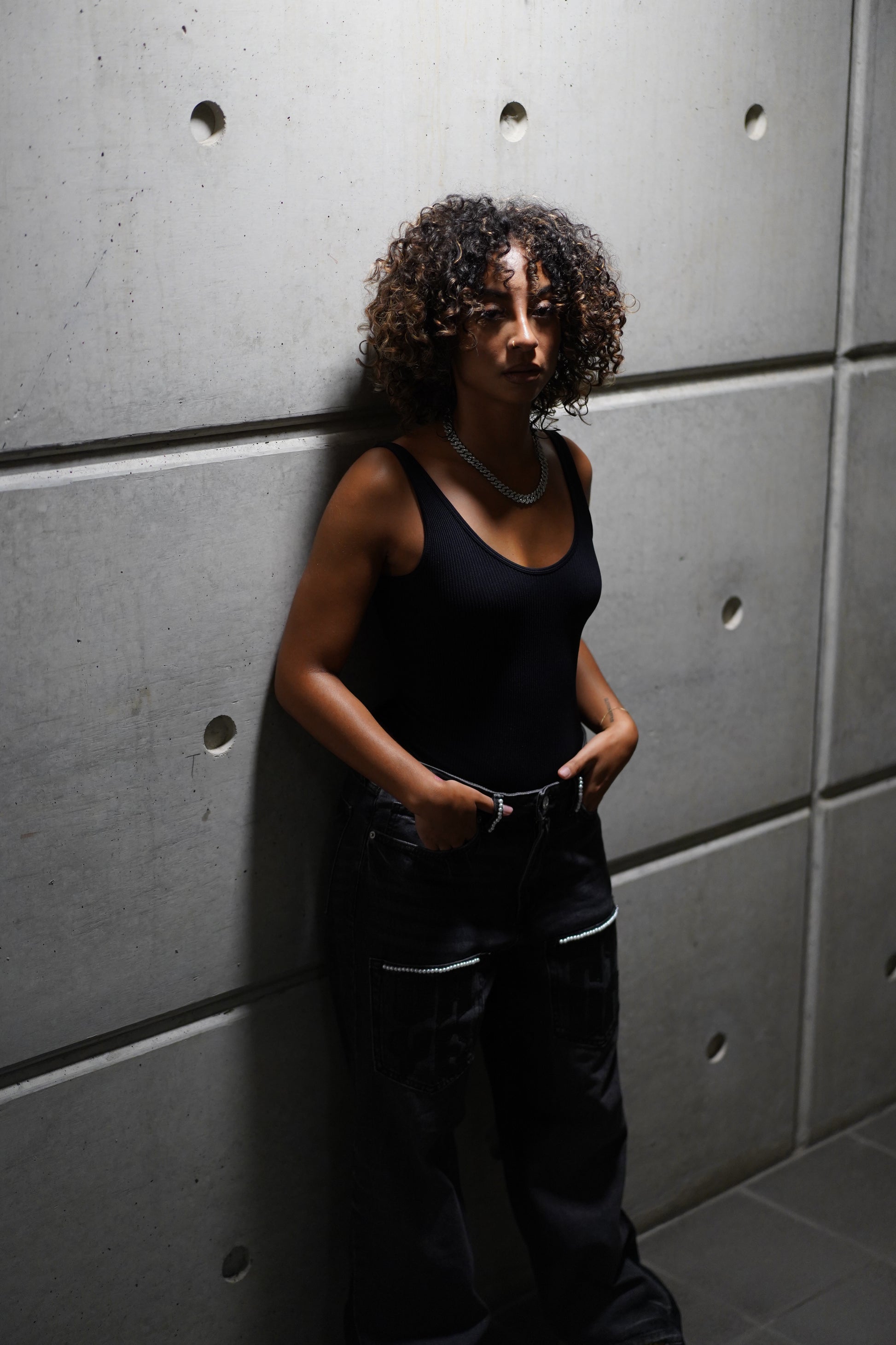 BLACK FLARED DENIM WITH PEARLS AND PATCHWORK