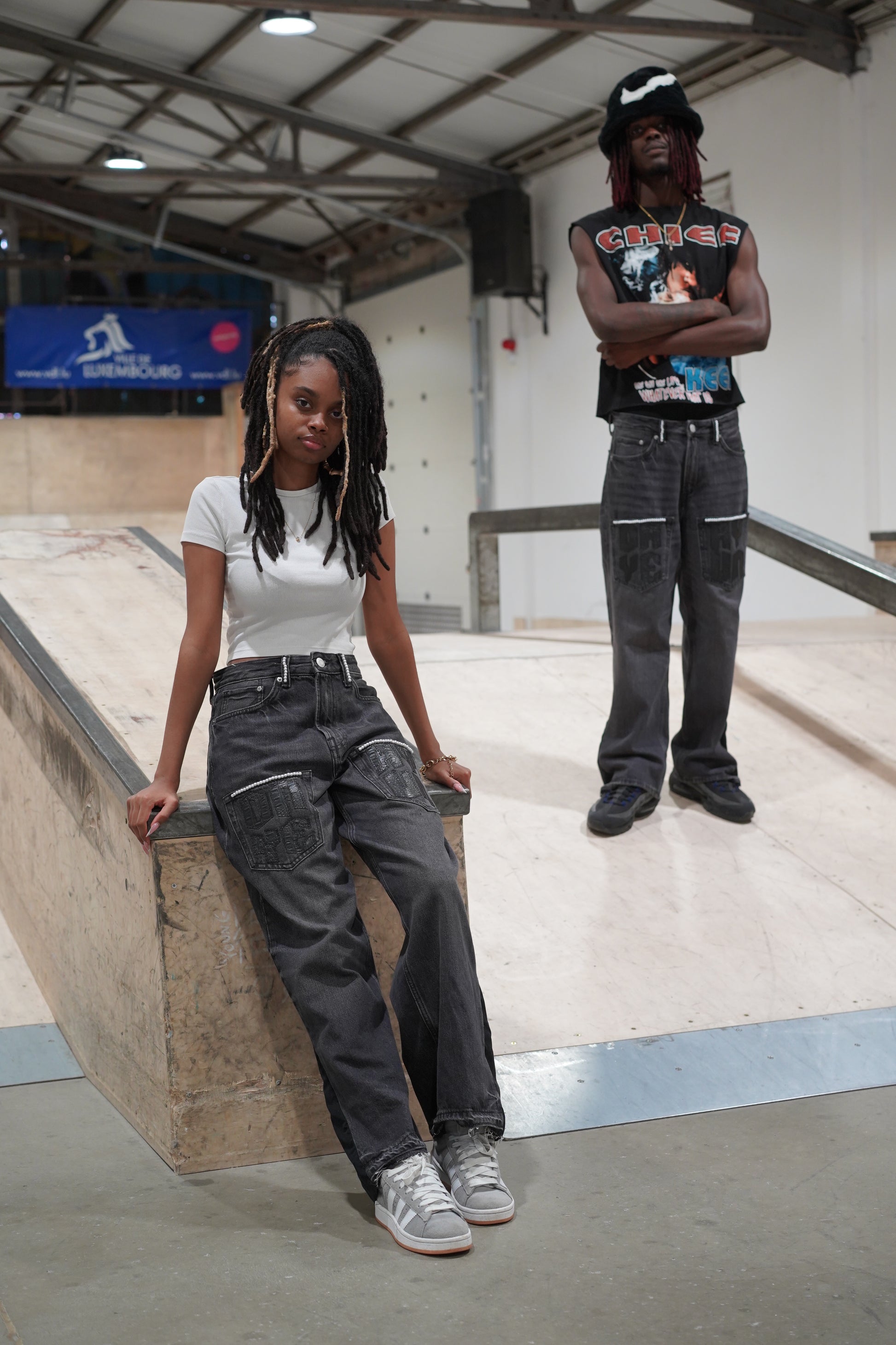 BLACK FLARED DENIM WITH PEARLS AND PATCHWORK